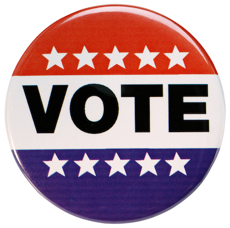 A vote button with red, white and blue stripes, stars, and the word "VOTE" on it.